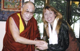 Isabel Losada together with the Dalai Lama